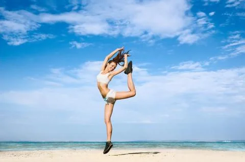 Exercising on the beach Fotos Stock