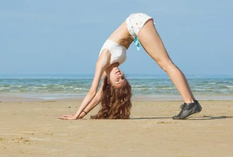 Exercising on the beach Photos