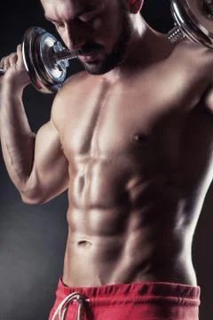 Exercising with dumbbell Stock Photos