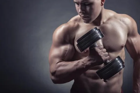 Exercising with dumbbell Stock Photos