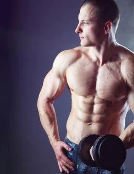 Exercising with dumbbell Stock Photos