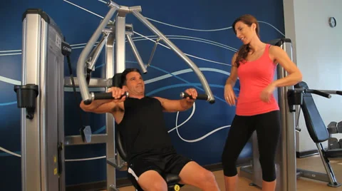 Exercising in gym workout weightlifting Stock Footage 33047179