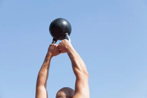 Exercising with a kettlebell Stock Photos