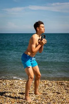 Exercising with a kettlebell weight Stock Photos