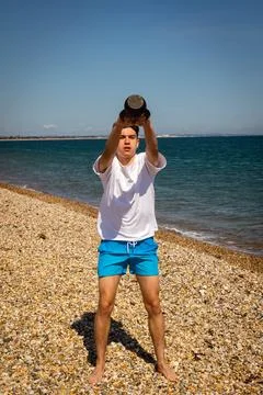 Exercising with a kettlebell weight Stock Photos