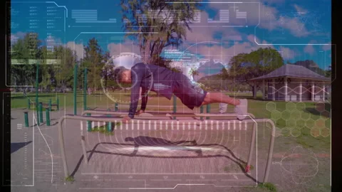 Exercising on parallel bars, man with digital animation overlay in park Stock Footage 306265416