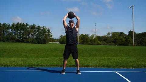Exercising, training, working out, medicine ball slams, 4k, 60fps. Stock Footage 116339701
