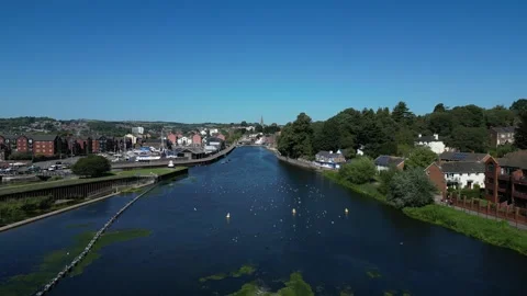 Exeter, Devon, England: DRONE VIEWS: River Exe, Exeter Ship Canal &amp; Trews Weir Stock Footage 265024746