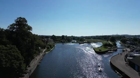 Exeter, Devon, England: DRONE VIEWS: River Exe, Exeter Ship Canal &amp; Trews Weir Stock Footage 265024877