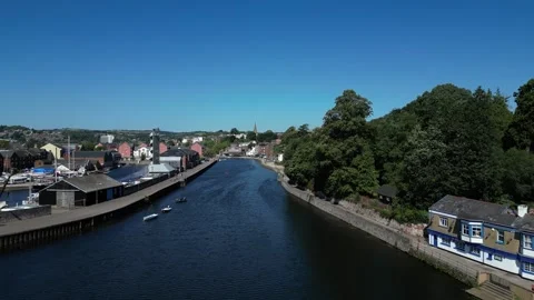 Exeter, Devon, England: DRONE VIEWS (LOW): River Exe, Exeter Ship Canal &amp; City Stock Footage 265024878