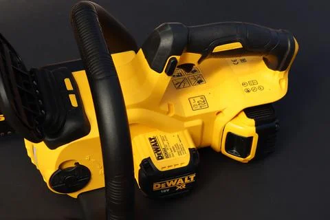 EXETER, DEVON, ENGLAND - JUNE 15TH 2021: Dewalt 18 volt cordless chainsaw on  Stock Photos