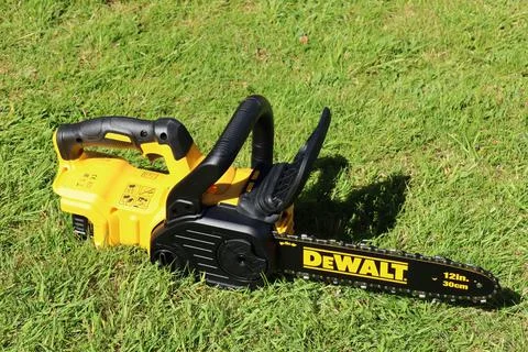 EXETER, DEVON, ENGLAND - JUNE 15TH 2021: Dewalt 18 volt cordless chainsaw on  Stock Photos