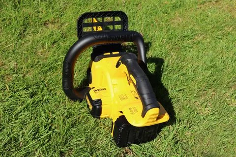 EXETER, DEVON, ENGLAND - JUNE 15TH 2021: Dewalt 18 volt cordless chainsaw on  Stock Photos