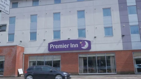 Exeter, United Kingdom. 28th June 2017 : Premier Inn, Logo sign from hotel. It Stock Footage