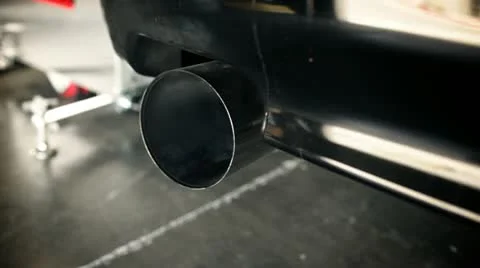 Exhaust muffler of high performance car acclerating 스톡 동영상 22409227