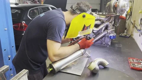 Exhaust pipe welding Stock Footage 218362623