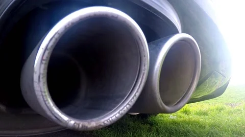 Exhaust pipes shaking, steaming up camera Stock Footage 60698254