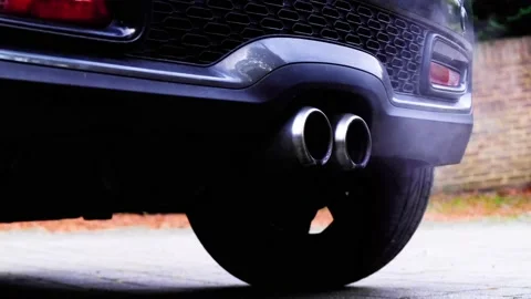 Exhaust Pollution From An Internal Combustion Engine Powered Car Stock Footage 163441316