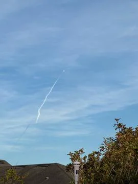 Exhaust trail from a rocket launch in Florida. Stock Photos