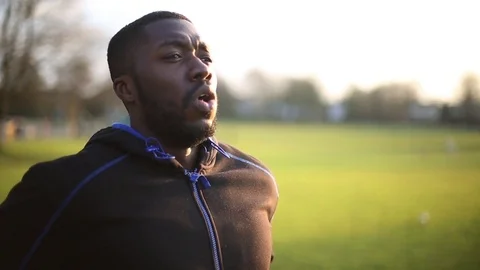 Exhausted Athlete at Sunset Stock Footage 71780697