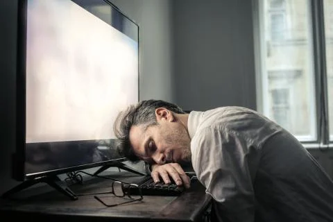Exhausted businessman Stock Photos