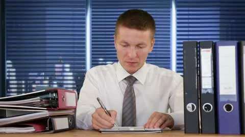 Exhausted Collar Worker receiving more Work and getting to sleep Stock Footage