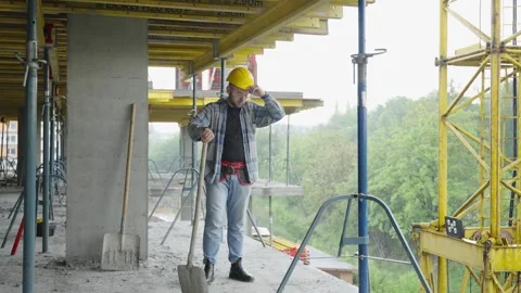 Exhausted construction worker taking a break on building site Stock-Footage 337467280