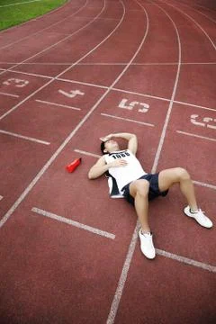 Exhausted man after training session Stock Photos