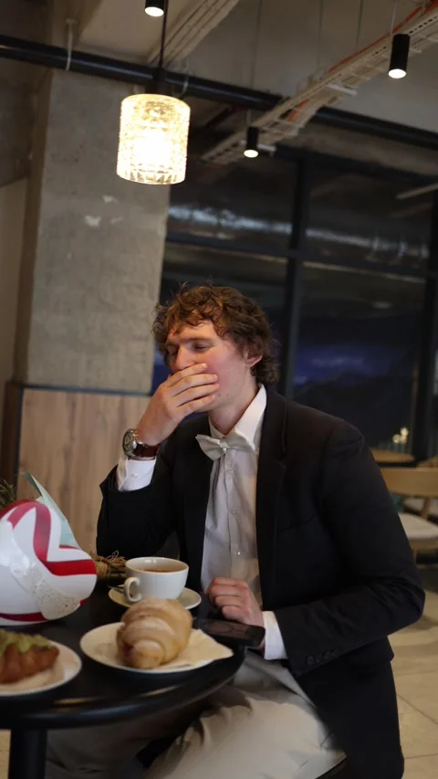 Exhausted man arriving to date after sleepless nights Stock Footage 328301349