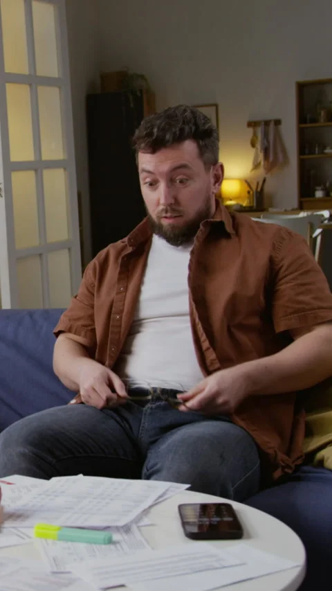 Exhausted Man Closing Computer Working From Home Vertical Stock Footage 327685086