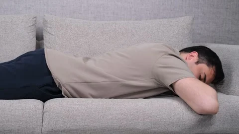 Exhausted man lying Video stock 269129440