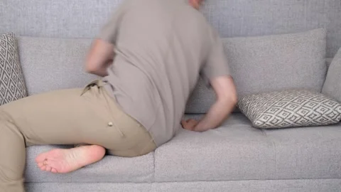 Exhausted man sleep on sofa Video stock 265674783
