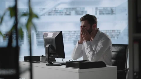 Exhausted man taking off glasses feeling eye strain from computer. Stressed Stock Footage 159621570