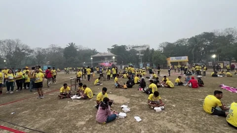 Exhausted marathon runner consuming their food after completion of marathon Stock-Footage 299880857