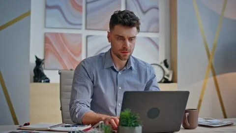 Exhausted professional close computer at cabinet closeup. Tired man problems Stock Photos