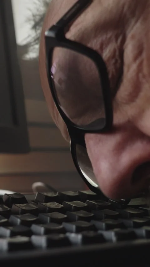 Exhausted Programmer Awakens From Keyboard During Late Night Work Session Stock Footage 336718846