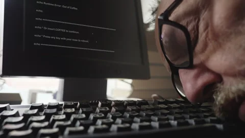 Exhausted Programmer Wakes on Keyboard After Working Through the Night Stock Footage 336716667
