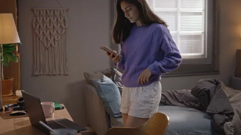 Exhausted Woman Checking Phone and Working on Laptop in Morning Stock Footage 344126886