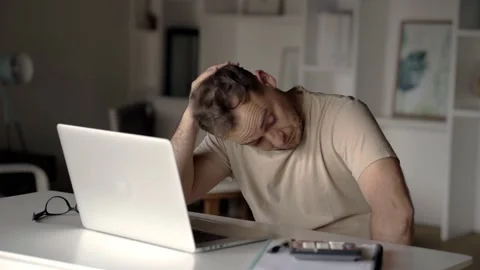 Exhausted working at screen has eye strain Stock Footage 221941992