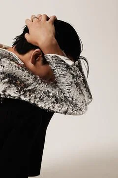 Exhausted young man posing on the white background. Mental health issues. Photos