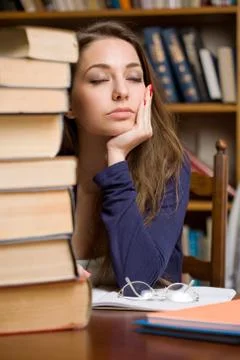 Exhausted young student. Stock Photos