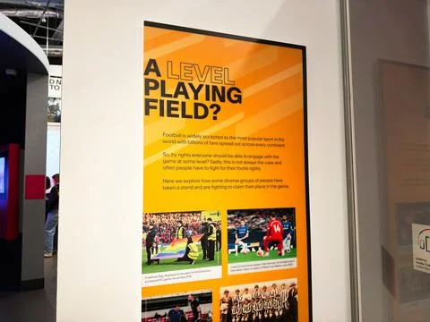 Exhibit panel about a level playing field and football equality displayed i.. Stock Photos
