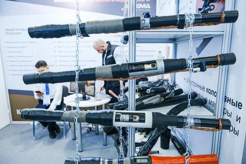Exhibition stand displaying cable joints and power equipment at industrial .. Stock Photos
