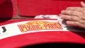 Exhibition sticker attaching to car metal surface, competition HD Footage