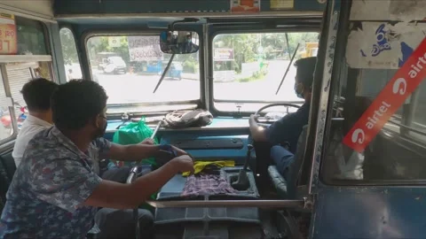 Exhilarating 4K Bus Ride Through the Traffic of Sri Lanka's Hill Country Stock Footage 216479934
