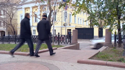 Exit From the Boulevard. Two Men Are to Move Pedestrian Across the Road. Cars Stock Footage 65231085