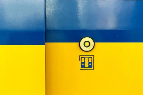 Exit door of the train with a button to automatically open the door on demand Stock Photos