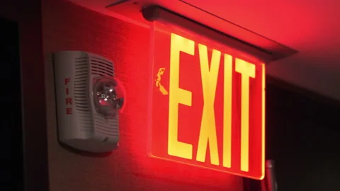 Exit emergency sign in 4K slow motion 60fps Stock Footage 170746166