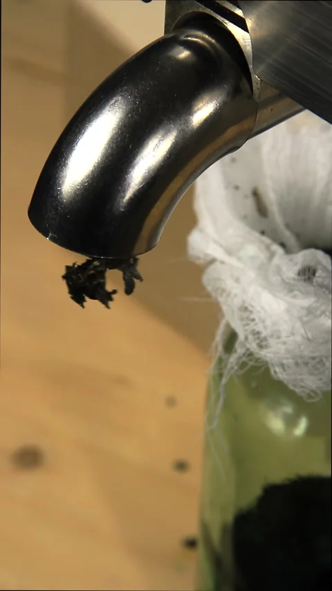 The exit of the extruder from which the waste of pressed sunflower seeds fly. Stock Footage 168888169