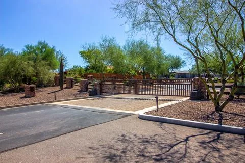 Exit Gate At Secure Housing Subdivision Stock Photos